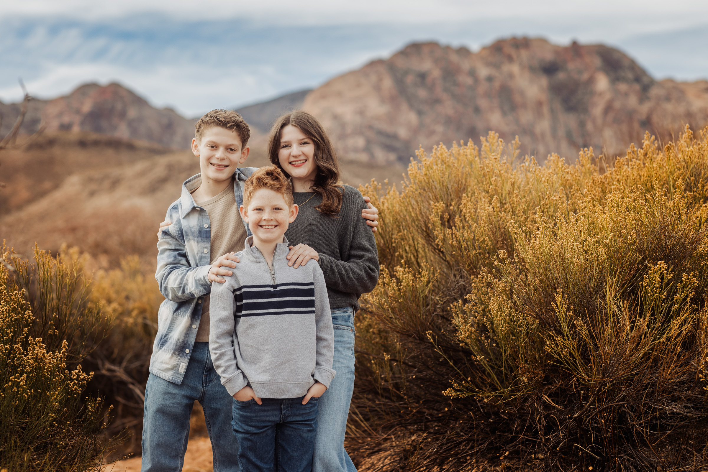 Family portrait session at Red Rock Canyon in late-afternoon light